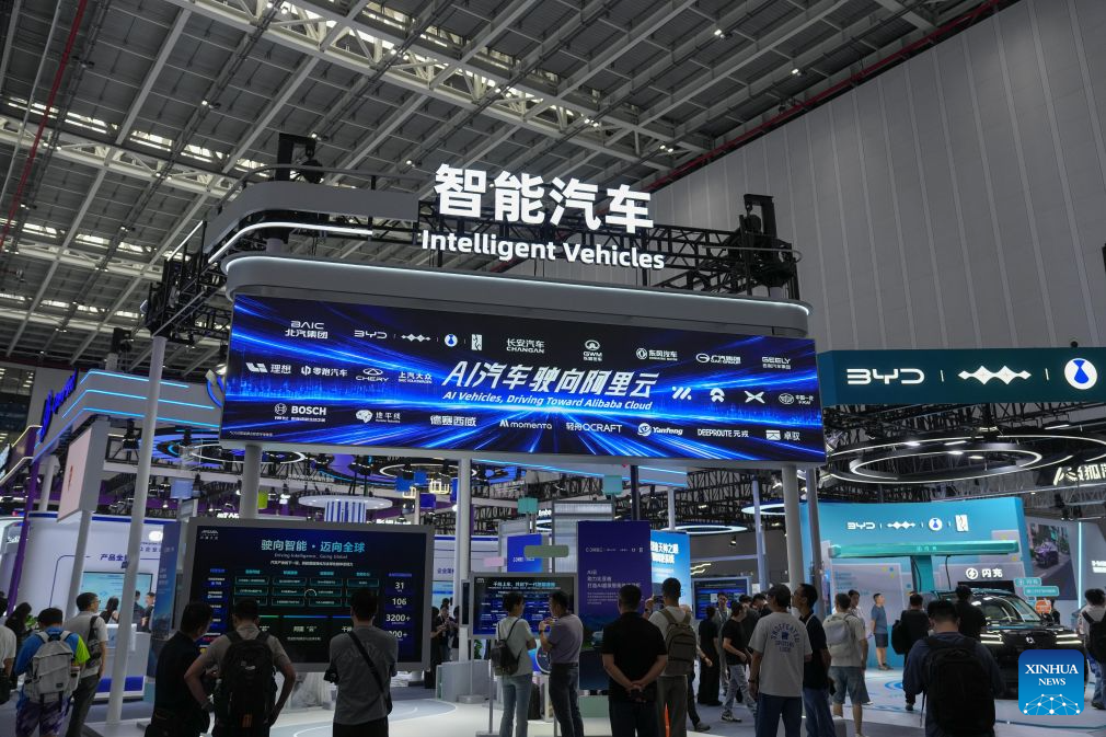 People visit the Intelligent Vehicles exhibition area during the 2026 Apsara Conference in Hangzhou, east China's Zhejiang Province, Sept. 22, 2026. The 2026 Apsara Conference opened here on Tuesday, and will last for three days. The conference has three main forums and more than 120 sub-forums. (Xinhua/Huang Zongzhi)