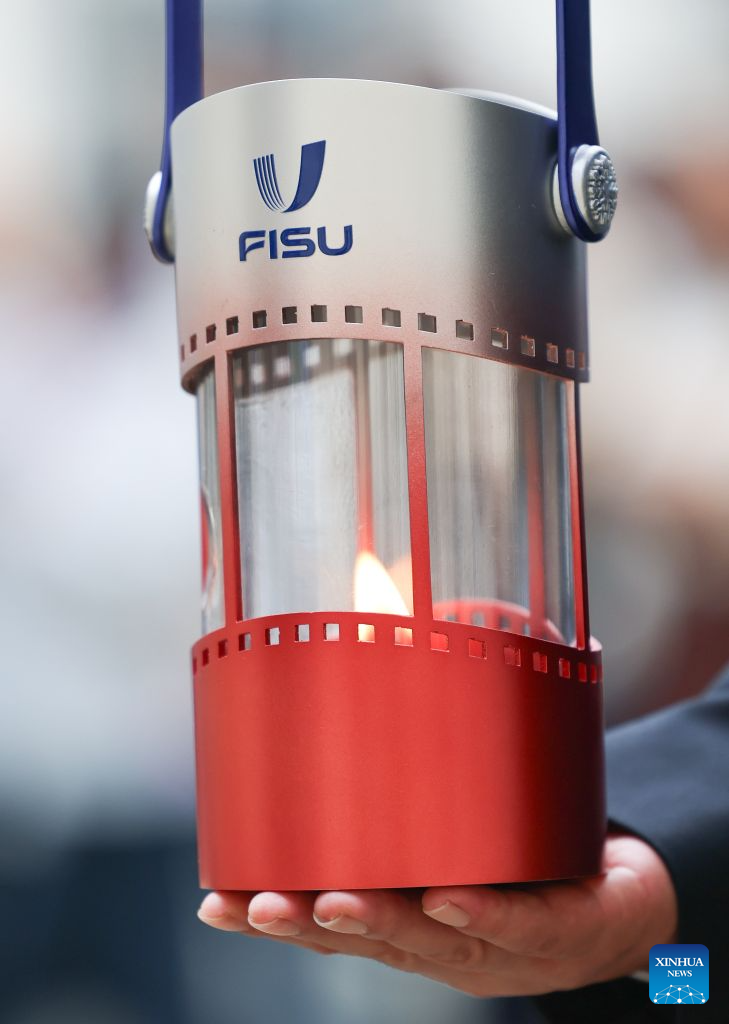 The flame lantern is seen after the flame collection ceremony for the Changchun 2027 Winter Universiade in Turin, Italy, Oct. 8, 2026. (Xinhua/Wang Kaiyan)