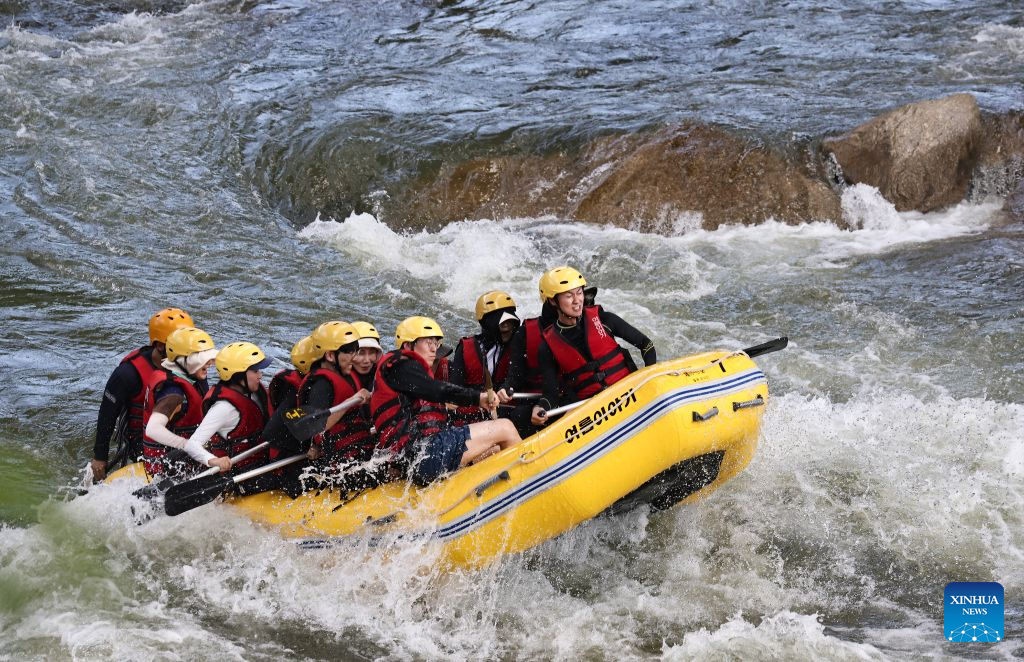 People enjoy rafting at Hantan river valley in Cheorwon, Gangwon province, South Korea, Aug. 2, 2026. (Photo by Jun Hyosang/Xinhua)