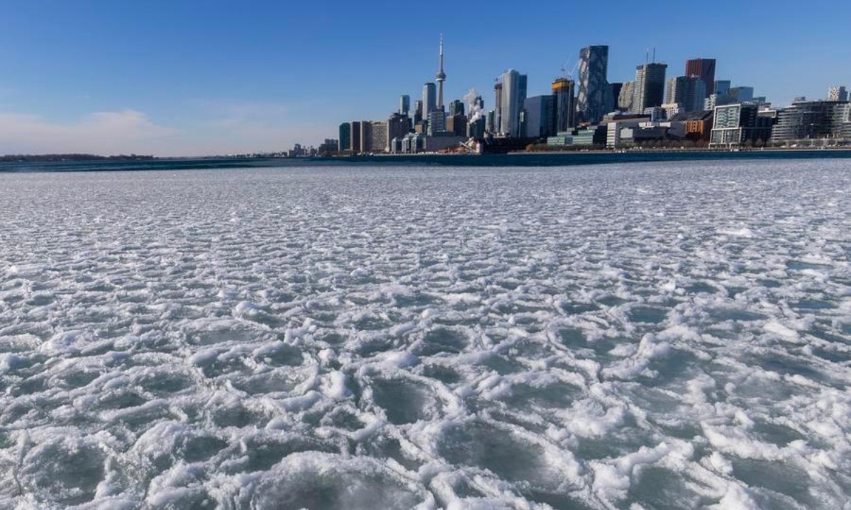 This photo taken on Jan. 21, 2025 shows the frozen Lake Ontario in Toronto, Canada. (Photo by Zou Zheng/Xinhua)