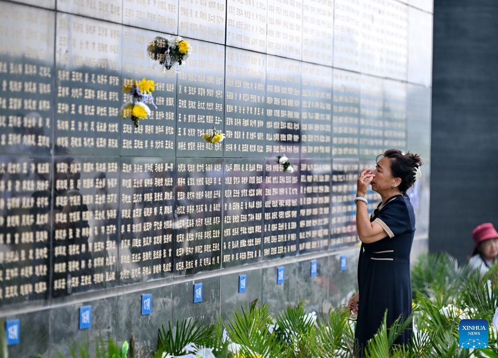A citizen mourns in front of a memorial wall inscribed with names of the victims at the Tangshan Earthquake Memorial Park in Tangshan, north China's Hebei Province, July 28, 2026. This year marks the 50th anniversary of the Tangshan Earthquake, a magnitude-7.8 quake that struck the city on July 28, 1976, taking the lives of more than 240,000 people and destroying virtually all buildings in the city.

Crowds of people visited the Tangshan Earthquake Memorial Park on Tuesday to mourn and remember the victims in the devastating disaster. (Xinhua/Mu Yu)