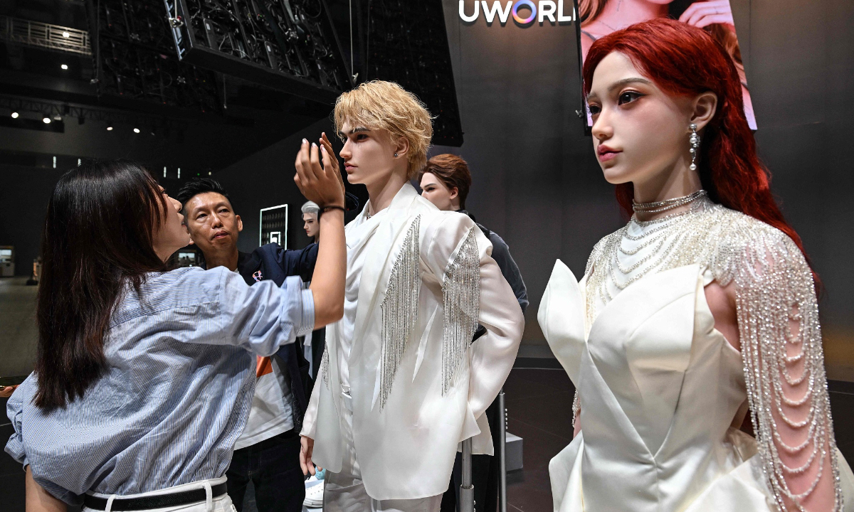 Humanoid robots are displayed during the launch of the U1 humanoid robot produced by UWORLD, a brand under UBTECH Robotics, in Shenzhen, China's Guangdong province on June 30, 2026. Photo: VCG