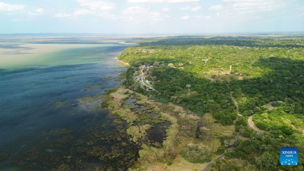 An aerial drone photo taken on Aug. 20, 2026 shows a view of Lake St. Lucia at iSimangaliso Wetland Park in KwaZulu-Natal Province, South Africa. Located in northern KwaZulu-Natal Province, the park features a rich diversity of ecosystems, including lakes, wetlands, beaches and coastal forests. It was inscribed on the UNESCO World Heritage List in 1999. (Xinhua/Chen Wei)