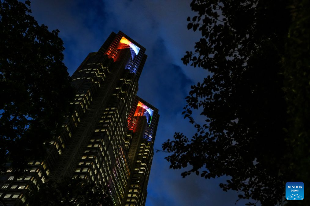 Tokyo Metropolitan Government is illuminated in colors for 2026 Aichi-Nagoya Asian Games to mark one month before the Games in Tokyo, Japan on Aug. 19, 2026. (Xinhua/Jia Haocheng)