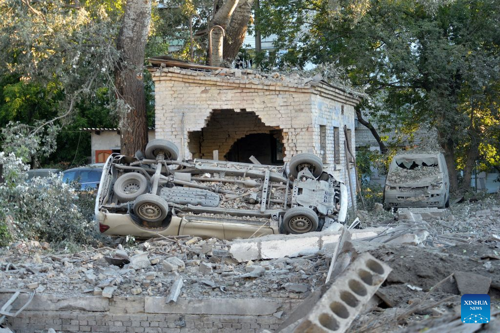 Photo taken on Aug. 20, 2026 shows vehicles damaged in a Russian overnight missile and drone attack in Kiev, Ukraine. A Russian overnight missile and drone attack hits Kiev, Ukraine, on August 20, 2026. (Photo by Peter Druk/Xinhua)