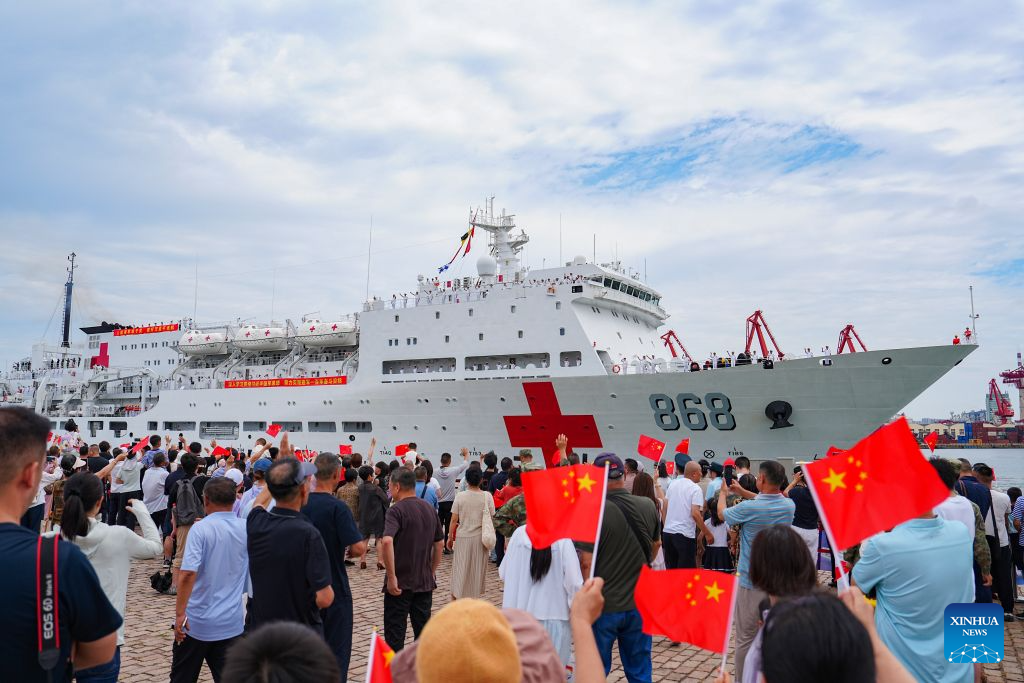 The Chinese People's Liberation Army (PLA) Navy hospital ship, Auspicious Ark, departs from a port in Qingdao, east China's Shandong Province, on July 22, 2026. The Chinese navy hospital ship departed from a port in Qingdao on Wednesday for a humanitarian medical service mission in Africa and South Asia. (Photo by Liu Zaiyao/Xinhua)