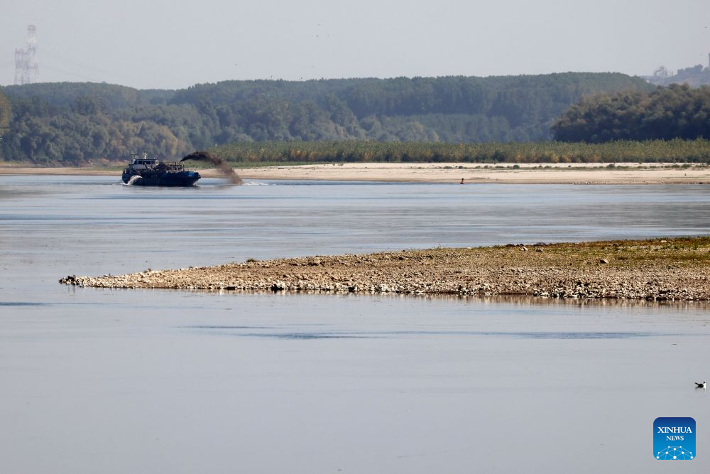 This photo taken on Aug. 5, 2026 shows the exposed riverbed of the Danube River in Rasova, southeastern Romania. Severe drought has triggered record-low water level of the Danube river. (Photo by Cristian Cristel/Xinhua)