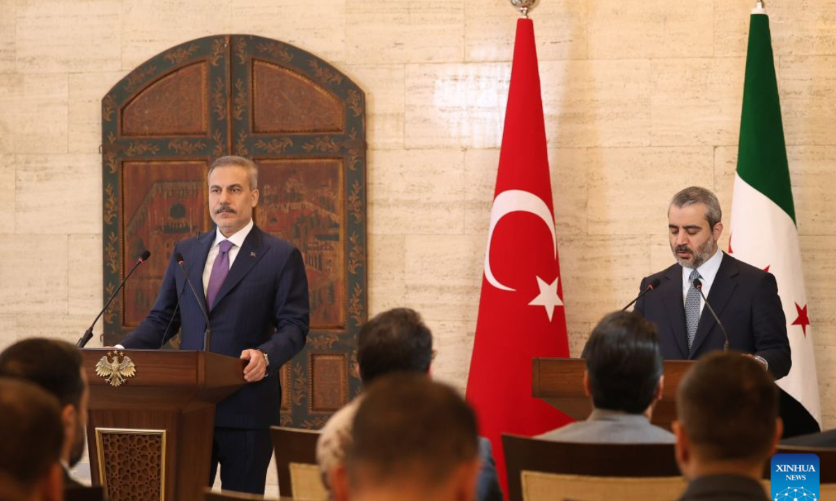 Turkish Foreign Minister Hakan Fidan (L) and Syrian foreign affairs chief Asaad Hassan al-Shibani attend a joint press conference in Damascus, Syria, Sept. 13, 2026. Turkish President Recep Tayyip Erdogan will visit Syria soon as Damascus and Ankara move to deepen political and economic cooperation, Fidan said Sunday. (Photo by Ammar Safarjalani/Xinhua)