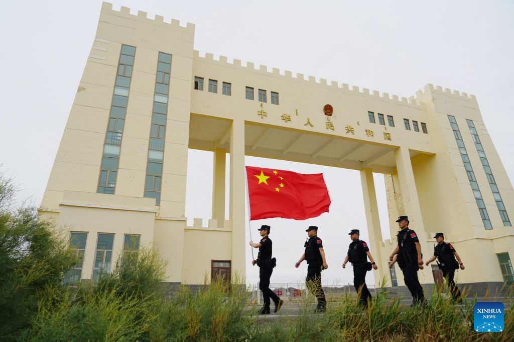 Li Junjie (2nd R) and colleagues patrol a border crossing in Mazongshan Town of northwest China's Gansu Province, July 15, 2026. Mazongshan Town is the only border town in northwest China's Gansu Province. Gongpoquan border checkpoint stands here along the China-Mongolia border.

Li Junjie started working as a border police officer at Gongpoquan border checkpoint at the age of 18, and has spent the past ten years working on the frontier.

His daily duties include checkpoint operations, vehicle inspections, border patrols and emergency response. Li has also taken an active role in field training. Based on the border policing tasks, he rehearses emergency response scenarios, breaks down standard duty procedures and shares his experience with younger colleagues to help sharpen their operational skills. (Photo by Ma Xiaowei/Xinhua)