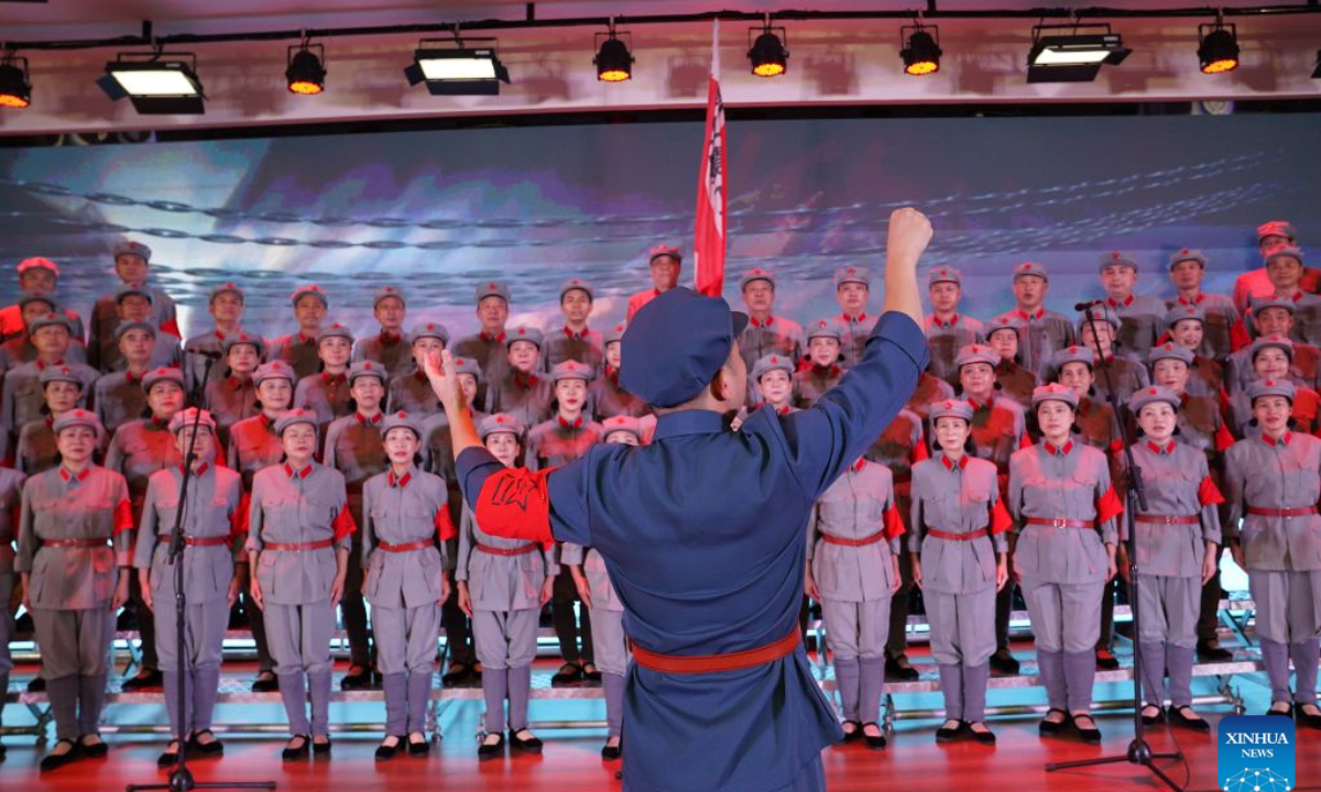 The Long March Origin choir perform at a middle school in Yudu County, east China's Jiangxi Province, Sept. 3, 2026. (Xinhua/Zhou Mi)