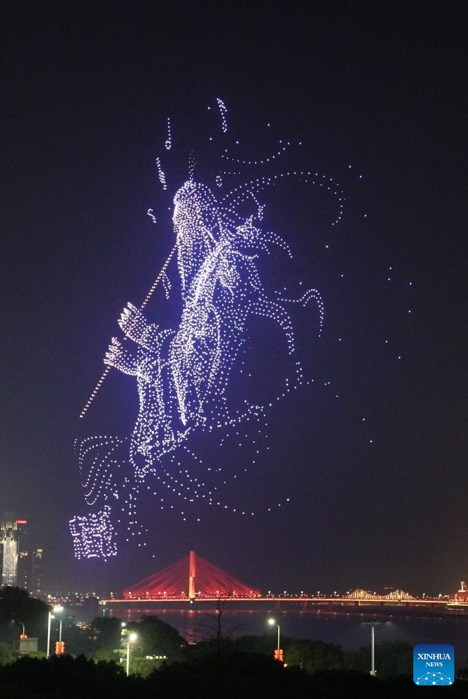 A drone show is staged over a square along Ganjiang River in Nanchang, east China's Jiangxi Province, Sept. 12, 2026. (Xinhua/Zhou Mi)