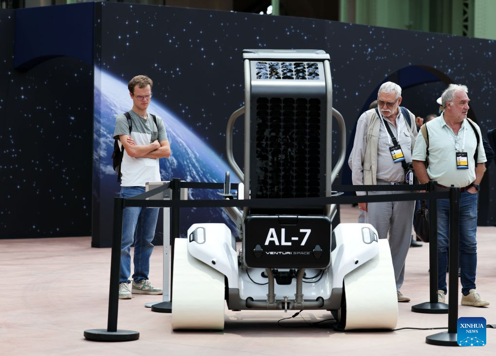Visitors check an exhibit during the International Space Summit at the Grand Palais in Paris, France, Sept. 9, 2026. The first International Space Summit opened Wednesday in Paris, bringing together heads of state and government, scientists, astronauts and industry representatives. (Xinhua/Wu Huiwo)