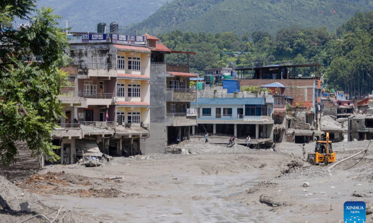 This photo taken on Aug. 27, 2026 shows a view of a massive flash flood-hit Nuwakot, Nepal. Nepal's National Disaster Risk Reduction Management Authority said that as many as 359 bodies had been recovered from flood-hit areas by Thursday evening, with 910 people still missing. (Photo by Sulav Shrestha/Xinhua)