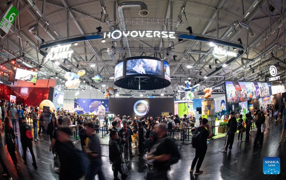 People visit the booth of HoYoverse at Gamescom 2026 in Cologne, Germany, Aug. 26, 2026. The world's largest trade fair for computer and video games Gamescom kicked off here on Wednesday. The five-day event is attended by more than 1,600 exhibitors from 67 countries and regions, over 70 percent of whom are international companies. (Xinhua/Zhang Haofu)