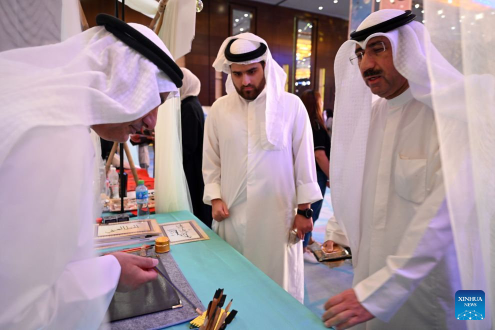 People attend a cultural event showcasing the traditions and tourism resources of north China's Hebei Province in Farwaniya Governorate, Kuwait, Sept. 19, 2026. The event kicked off here on Saturday evening, drawing more than 300 guests. (Photo by Asad/Xinhua)