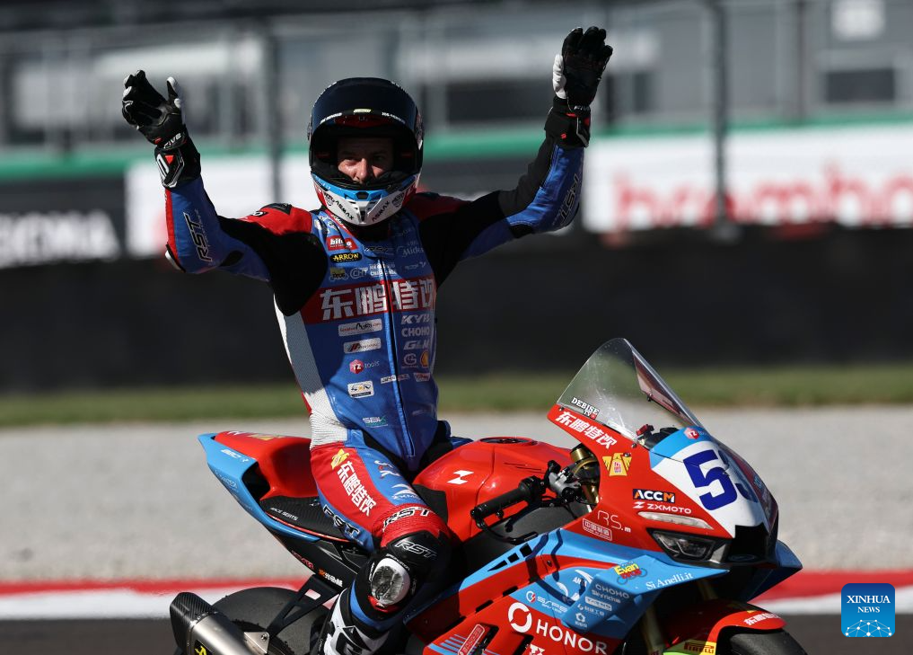 Valentin Debise of EASTROC ZXMOTO Evan Bros Factory salutes the crowd after the Race 2 of WorldSSP at the FIM Supersport World Championship Italian Round Cremona Circuit, Italy, Sept. 27, 2026. (Xinhua/Li Jing)