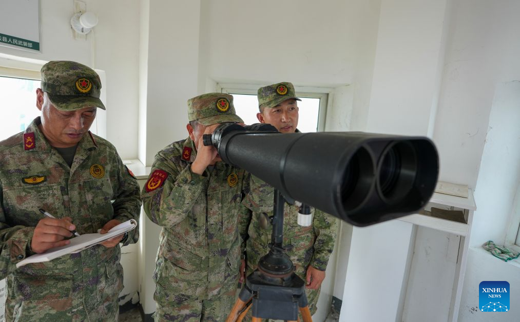 Militia members monitor the surrounding waters on Kaishan Island in east China's Jiangsu Province, Sept. 13, 2026. (Xinhua/Li Bo)