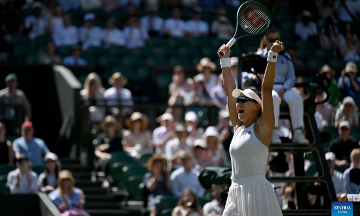 Guo Hanyu celebrates after winning the women's doubles title at the Wimbledon Championships in London on July 12, 2026. Photo: Xinhua