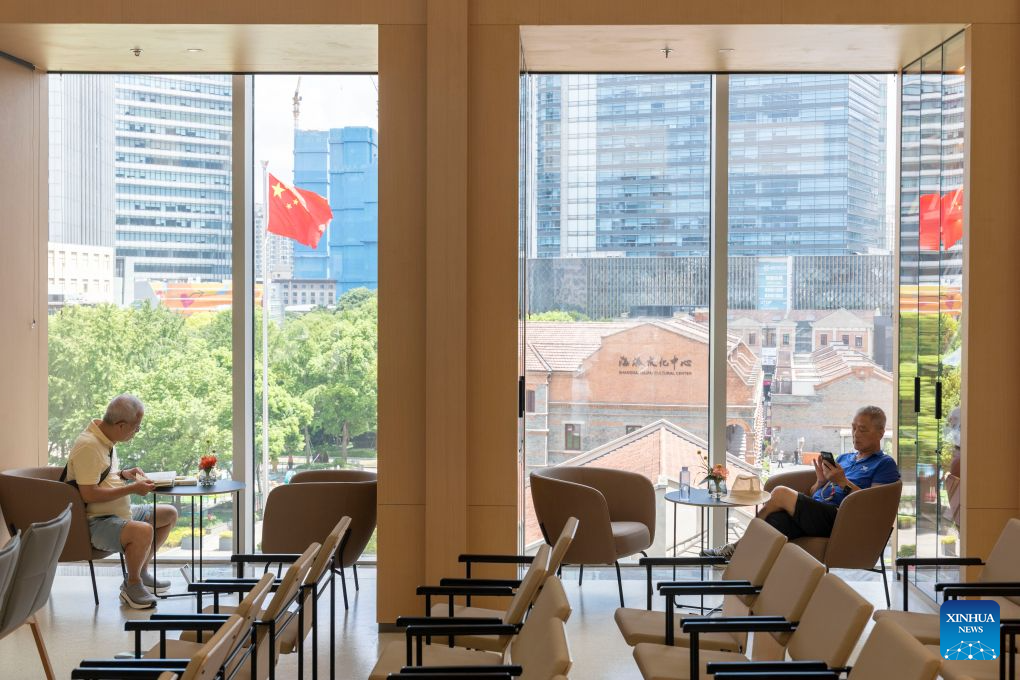 People read at the Shanghai Literature Museum in Hongkou District, east China's Shanghai, Aug. 27, 2026. After years of preparation, the Shanghai Literature Museum, a comprehensive literary institution, officially opened to the public on Thursday, offering a concentrated showcase of the evolution and remarkable achievements of Shanghai literature.
The museum consists of a main building and three historic buildings, featuring five permanent exhibition zones that reveal the history and character of Shanghai literature from different perspectives. (Xinhua/Wang Xiang)