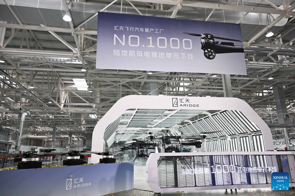 Electric propulsion systems for ARIDGE's flying car are pictured at ARIDGE's plant for mass production of flying cars in Guangzhou, south China's Guangdong Province, Aug. 10, 2026.

A roll-off ceremony for the 1,000th set of electric propulsion system for ARIDGE's flying car, dubbed the Land Aircraft Carrier, was held at the company's plant for mass production of flying cars in Guangzhou on Monday.

ARIDGE is a pioneering developer of low-altitude mobility solutions based in Guangdong. Its plant for mass production of flying cars here, covering an area of approximately 120,000 square meters, mainly manufactures the airborne component of the Land Aircraft Carrier. (Xinhua/Deng Hua)