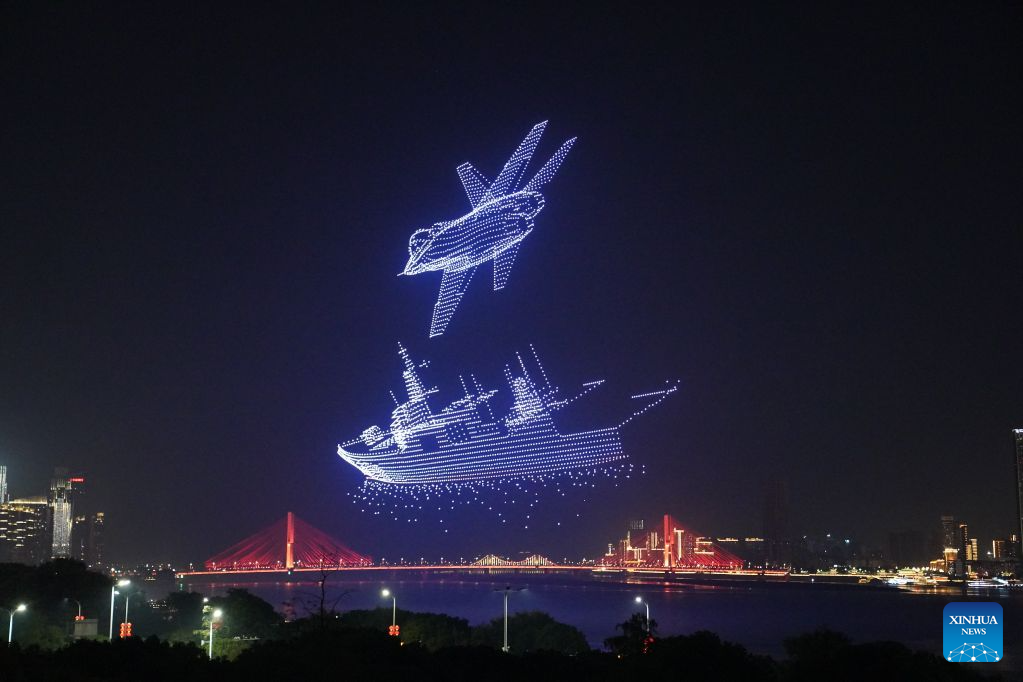 A drone show is staged over a square along Ganjiang River in Nanchang, east China's Jiangxi Province, Sept. 12, 2026. (Xinhua/Zhou Mi)