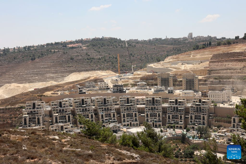 This photo taken on Aug. 9, 2026 shows an Israeli settlement under construction in the West Bank, near Jerusalem. In recent years, Israel's continued approval of settlement expansions in the region has drawn widespread criticism from the international community. (Photo by Gil Cohen Magen/Xinhua)