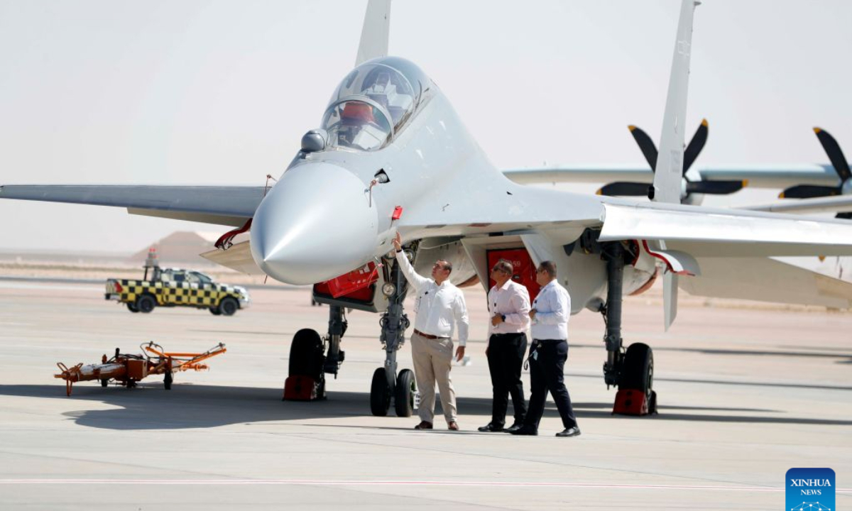 Visitors look at an aircraft on display at the El Alamein International Airshow at El Alamein International Airport in El Dabaa, Egypt, Sept. 8, 2026. Egyptian President Abdel Fattah El-Sisi on Tuesday inaugurated the second edition of the El Alamein International Airshow at El Alamein International Airport on Egypt's Mediterranean coast. (Xinhua/Ahmed Gomaa)
