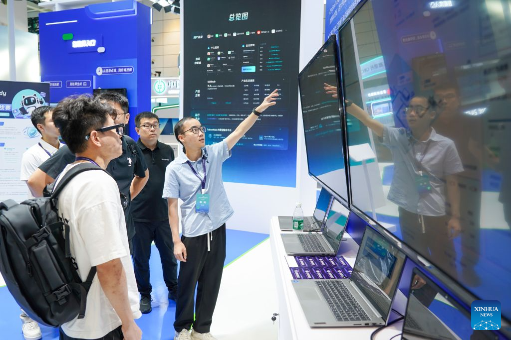Attendees visit the experience zone of cybersecurity technology applications at the 2026 China Cybersecurity Week in Jinan, east China's Shandong Province, Sept. 14, 2026. The 2026 China Cybersecurity Week held its opening ceremony here on Monday. The event will be held across China from Sept. 14 to 20. (Xinhua/Zhu Zheng)