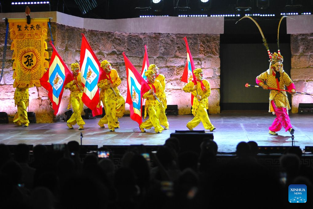 Artists of the China National Peking Opera Company perform at the ancient theatre of Carthage in Tunis, Tunisia, Aug. 11, 2026. The China National Peking Opera Company presented a performance on Tuesday at the Folklores of the World event during the 60th Carthage Festival in Tunis. (Photo by Adel Ezzine/Xinhua)