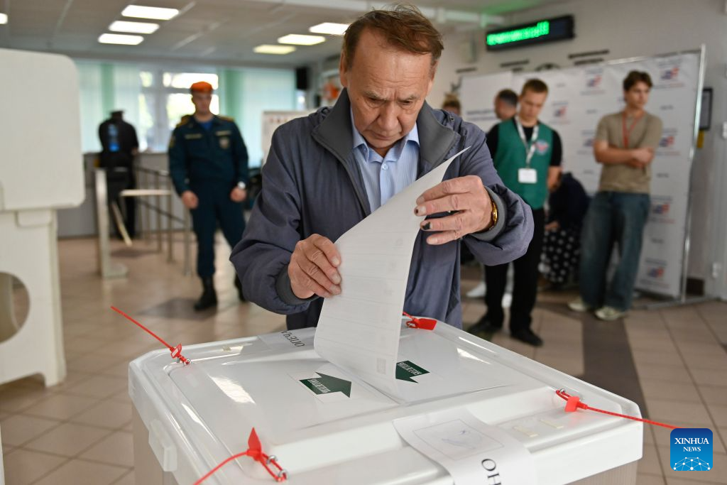 A voter casts her ballot at a polling station in Moscow, Russia, on Sept. 20, 2026. Elections for deputies to the ninth convocation of the State Duma, the lower house of parliament, ran from Sept. 18 to 20. (Photo by Alexander Zemlianichenko Jr/Xinhua)