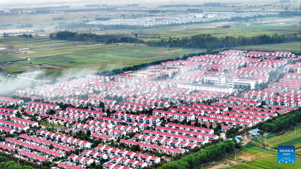 A drone photo taken on Sept. 17, 2026 shows a view of Xingdong New Village of Dongming County in Heze, east China's Shandong Province. The Yellow River, dubbed the Mother River of China, has long nourished the land in Heze, east China's Shandong Province, but recurring floods once posed a persistent threat to residents living on its floodplain. To protect local residents from flooding, a large-scale relocation and reconstruction project was launched in 2017 and completed in 2020.
Some 600,000 residents from the floodplain moved into newly built communities with improved housing and access to kindergartens, community clinics, elderly care centers and public spaces. In recent years, local authorities have also developed agriculture, rural processing and tourism-related industries to create more income opportunities for residents. (Xinhua/Chen Yehua)