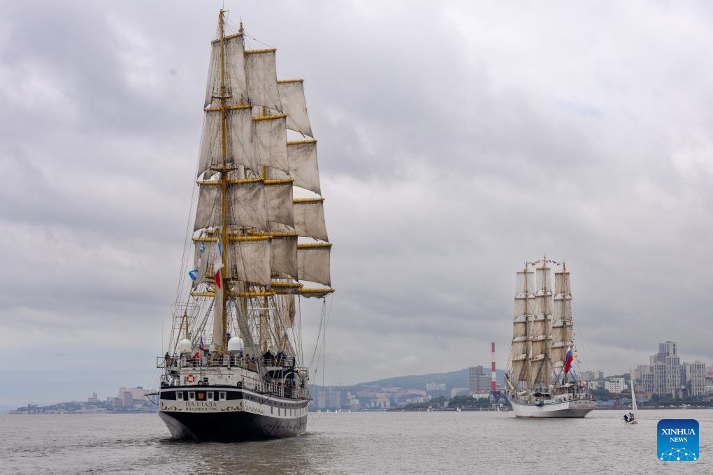 Sailboats are pictured during a parade of sails in Vladivostok, Russia, Sept. 1, 2026. A parade of sails was held during the 11th Eastern Economic Forum (EEF) on Tuesday, with more than 1,000 sailing enthusiasts participating. (Photo by Andrey Matveenko/Xinhua)