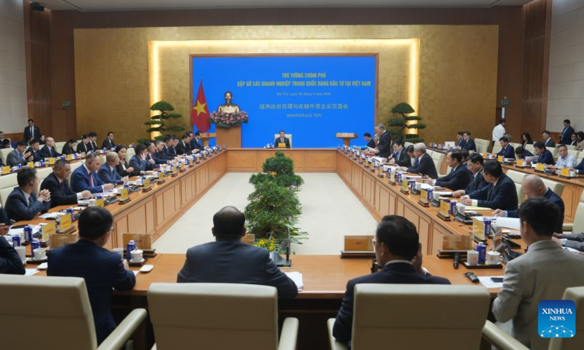 Chinese enterprises operating in Vietnam attend a meeting chaired by Vietnamese Prime Minister Le Minh Hung in Hanoi, Vietnam, Aug. 26, 2026. Vietnamese Prime Minister Le Minh Hung said Wednesday that the Vietnamese government will effectively safeguard the development rights and interests of Chinese enterprises and work to create a model of mutually beneficial and win-win cooperation. (Xinhua/Hu Jiali)