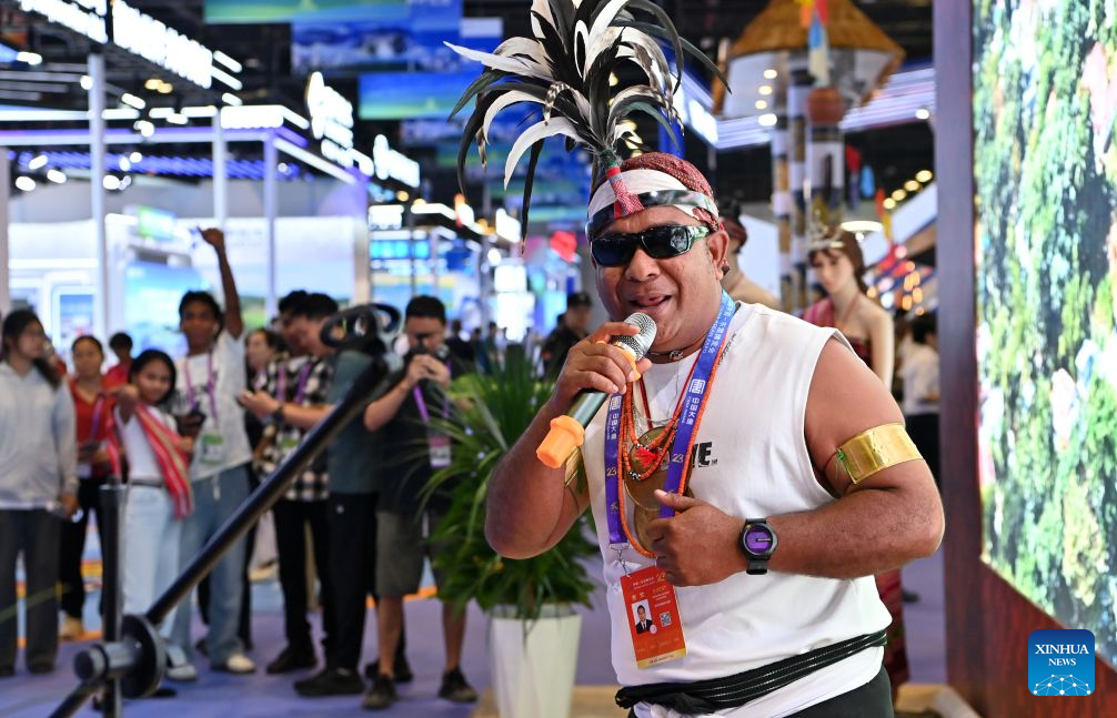 A man from Timor-Leste performs during the 23rd China-ASEAN Expo in Nanning, south China's Guangxi Zhuang Autonomous Region, Sept. 18, 2026. Various cultural performances have become highlights of the ongoing 23rd China-ASEAN Expo. (Xinhua/Lu Boan)