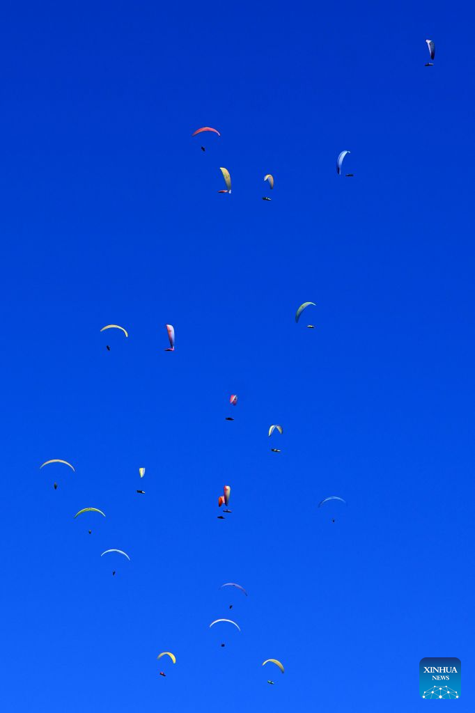 Participants compete during the 18th World Air Sports Federation (FAI) European Paragliding Championships in Krushevo, North Macedonia, Aug.16, 2026. The event is taking place from Aug. 8 to 19, bringing together 130 of Europe's top pilots. (Photo by Tomislav Georgiev/Xinhua)