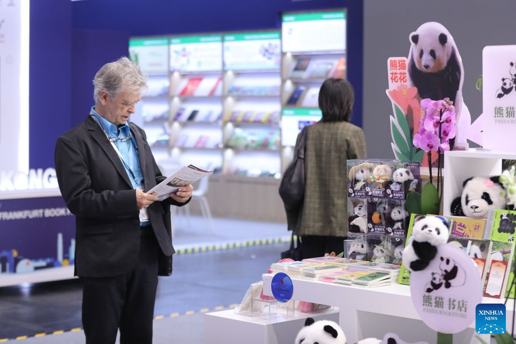 A reader is seen at the Chinese joint exhibition booth of the Frankfurt Book Fair in Frankfurt, Germany, Oct. 7, 2026. The world's largest book fair opened Wednesday in Frankfurt, Germany, bringing together more than 4,000 publishing institutions from over 100 countries and regions.

The Chinese joint exhibition booth covers 336 square meters and features more than 3,000 titles and over 4,600 copies of selected books. It combines book displays, rights negotiations, cultural exchanges and interactive experiences. (Xinhua/Du Zheyu)