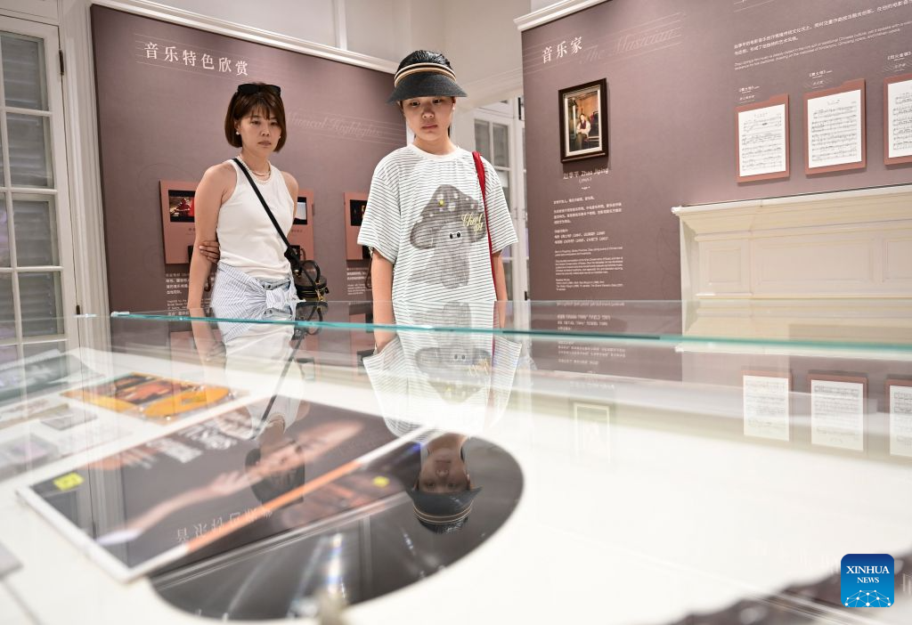 People visit the China Film Music Exhibition Hall on Gulangyu Island in Xiamen, southeast China's Fujian Province, Aug. 22, 2026.
Leveraging its rich historical and cultural heritage, the city of Xiamen has strived to bring traditional heritage into modern-day life and developed a range of cultural spaces that blend ancient traditions with modern styles. (Xinhua/Lin Shanchuan)