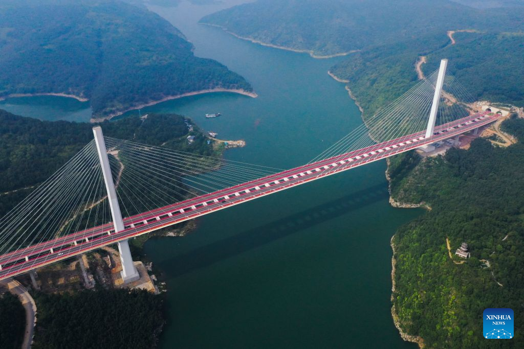 An aerial drone photo taken on Aug. 20, 2026 shows a view of a grand bridge at the Danjiangkou Reservoir in Nanyang, central China's Henan Province. (Photo by Kong Weijia/Xinhua)
