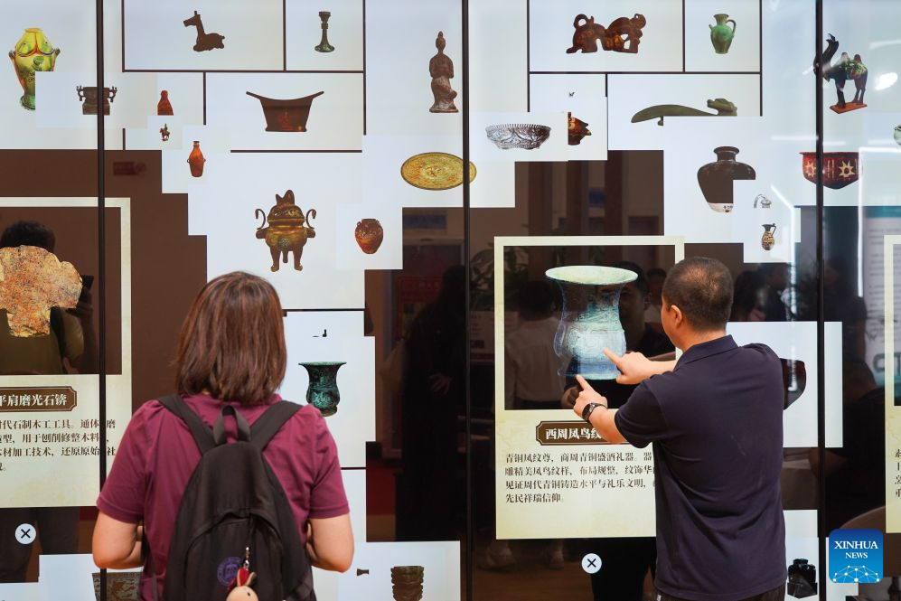 Visitors interact with a digital screen during the 16th China International Digital Publishing Expo in Jinan, east China's Shandong Province, Aug. 27, 2026.
The expo will run from Aug. 27 to 29 in Jinan, capital of east China's Shandong Province. First held in 2005, the expo is a major platform aimed at promoting the development of the digital publishing industry. (Xinhua/Zhu Zheng)