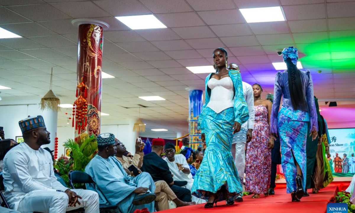 Photo taken on Sept. 18, 2026 shows Nigerian models performing during the China-Nigeria Fashion Show at the China Culture Center in Abuja, Nigeria. (Photo by Walekazm/Xinhua)