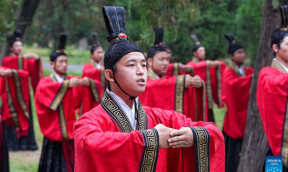 Actors dressed in traditional attire perform during a grand ceremony honoring Confucius in Qufu, east China's Shandong Province, Sept. 28, 2026. A grand ceremony honoring the ancient Chinese sage Confucius was held on Monday in Qufu, the hometown of Confucius, to commemorate the 2,577th anniversary of his birth. (Xinhua/Zhu Zheng)