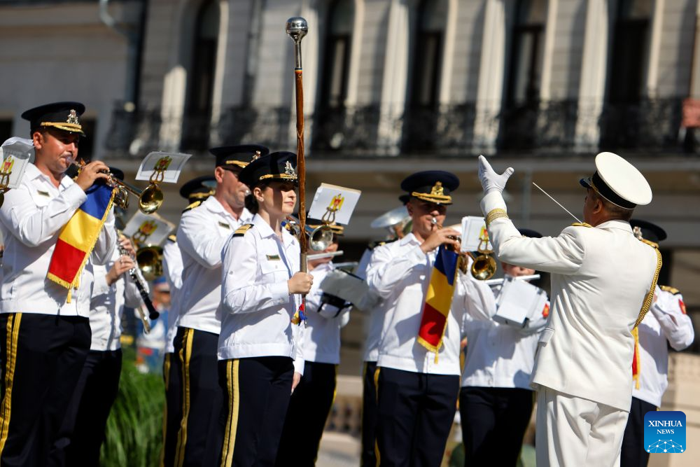 A military band performs during ceremonies marking the National Anthem Day in Bucharest, Romania, July 29, 2026. (Photo by Cristian Cristel/Xinhua)