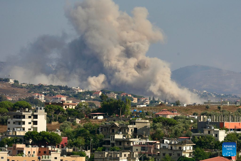 Photo taken on July 29, 2026 shows smoke rising from houses in Kfar Tebnit after Israeli army bombardments in Nabatieh, southern Lebanon. (Photo by Ali Hashisho/Xinhua)