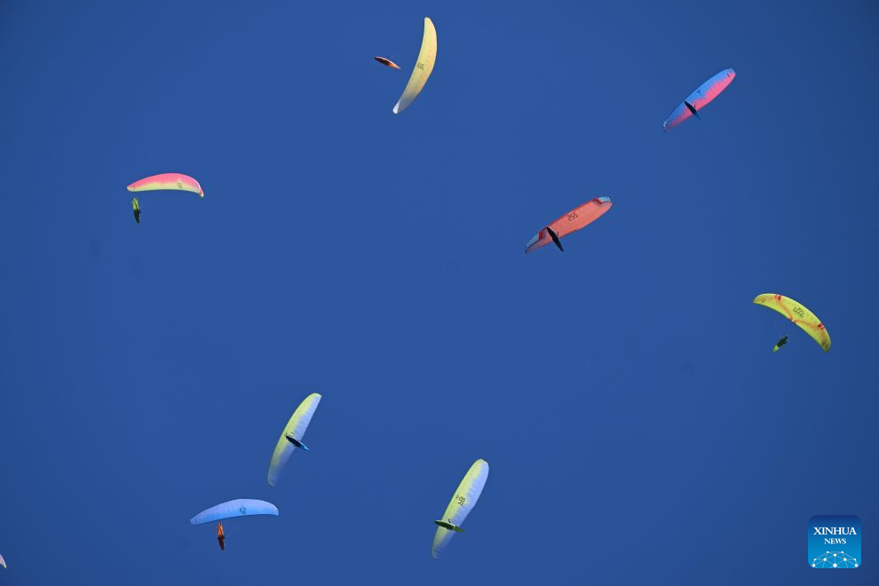 Participants compete during the 18th World Air Sports Federation (FAI) European Paragliding Championships in Krushevo, North Macedonia, Aug.16, 2026. The event is taking place from Aug. 8 to 19, bringing together 130 of Europe's top pilots. (Photo by Tomislav Georgiev/Xinhua)