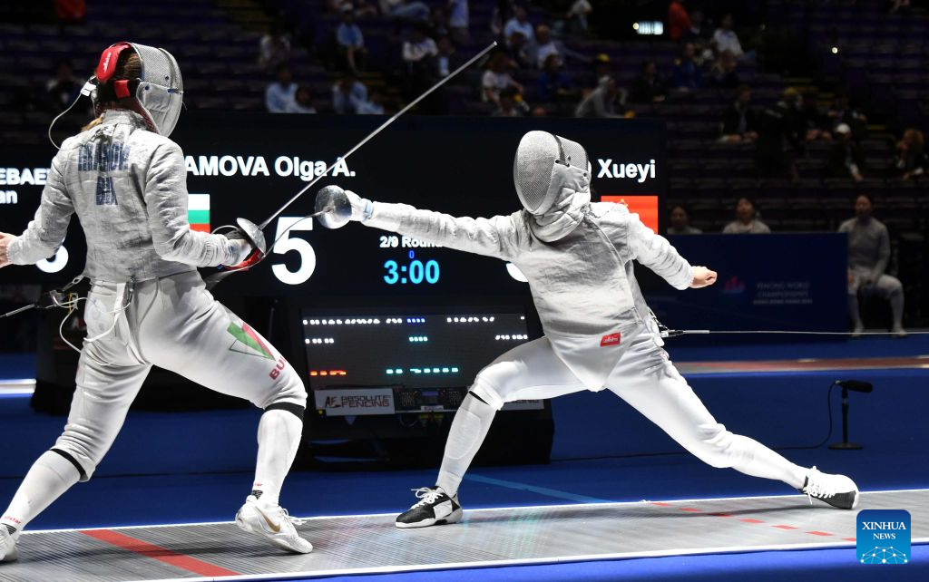 Rao Xueyi (R) of China competes with Olga A. Hramova of Bulgaria during the team women's sabre round of 16 match between China and Bulgaria at the 2026 Fencing World Championships in Hong Kong, south China, July 29, 2026. (Xinhua/Lo Ping Fai)