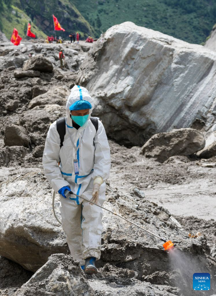 A health worker carries out disinfection work at the core affected zone of the mudslide-hit Gyirong Port in southwest China's Xizang Autonomous Region, Sept. 3, 2026. Teams of health workers from multiple units carried out comprehensive disinfection work at the core affected zone of the mudslide-hit Gyirong Port on Thursday. To date, a total of 35,500 square meters have been disinfected. (Xinhua/Jigme Dorje)