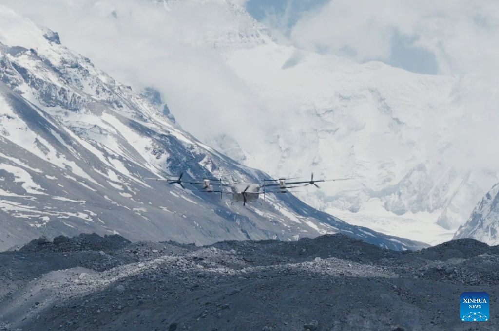 This photo shows DJI EV50, a latest vertical take-off and landing fixed-wing hybrid drone, working on the northern slope of Mount Qomolangma in southwest China's Xizang Autonomous Region, on May 21, 2026. A joint Chinese scientific expedition team has successfully measured vertical ozone distribution data from the ground up to an altitude of 8,861 meters above sea level in the Mount Qomolangma area. Using the latest vertical take-off and landing fixed-wing hybrid drone, the joint team from the Peking University (PKU) and Chinese Academy of Sciences also fully captured the entire process of downward ozone transport driven by glacier winds. These achievements have added a crucial piece of observational evidence to the study of high-concentration ozone and its changing trends over the Qinghai-Tibet Plateau in western China. (Xinhua)