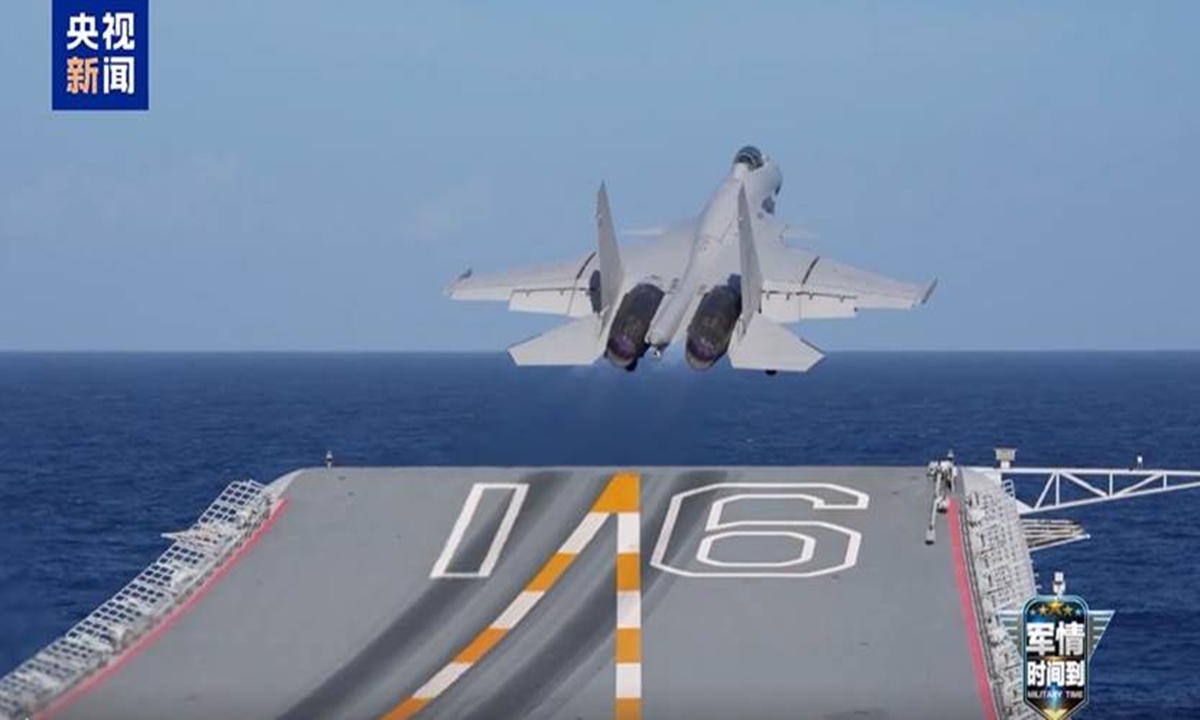 A J-15T fighter jet takes off from the flight deck of the aircraft carrier Liaoning. Photo: Screenshot from the CCTV News