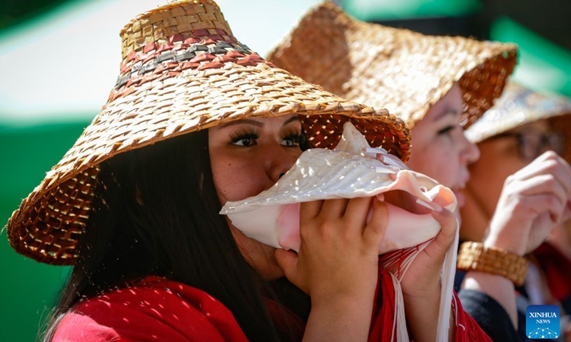 An Indigenous woman performs during a National Indigenous Peoples Day event in Vancouver, British Columbia, Canada, on June 21, 2026. (Photo by Liang Sen/Xinhua)