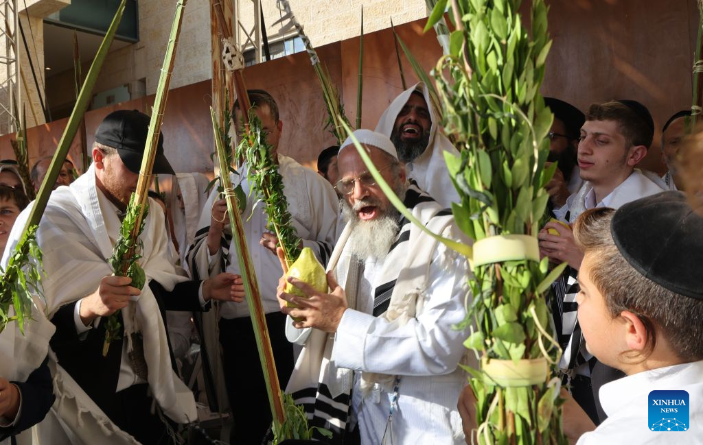 Jewish worshippers attend a prayer ceremony during the Sukkot holiday in the Old City of Jerusalem on Sept. 28, 2026. (Photo by Gil Cohen Magen/Xinhua)